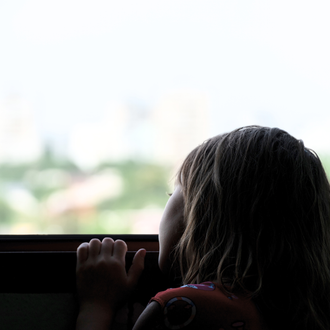 child looking out the window