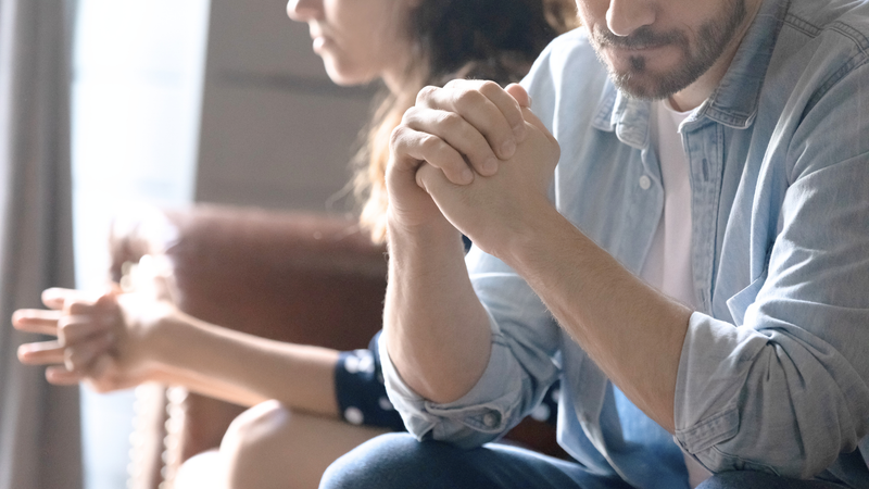 couple facing away from each other