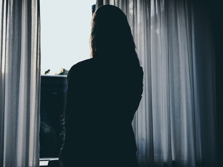 Abuse woman window